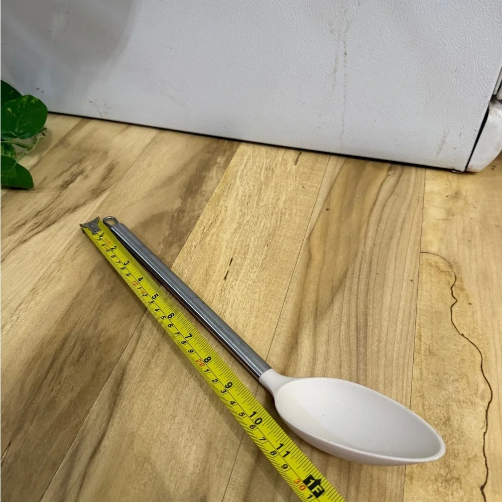 Elegant Silver and White Kitchen Spoon